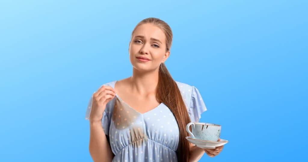 woman with coffee stained dress