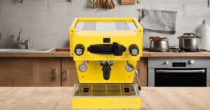 Yellow La Marzocco espress machine on kitchen bench